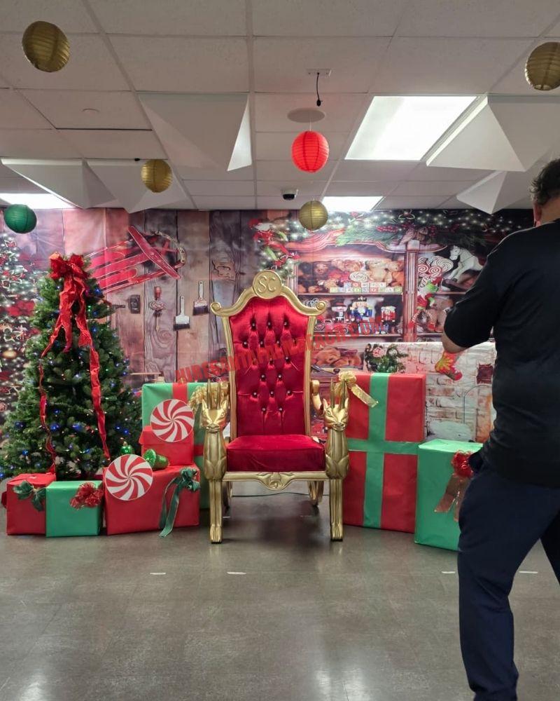 Santa chair photos: empty gold throne among gift boxes, a lit tree, and a workshop backdrop.